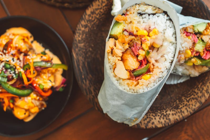 Veggie Supreme Burrito loaded with fresh vegetables and guacamole
